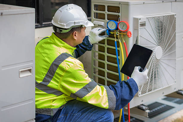 Professional Heat Pump Repair technician working in Byers, CO